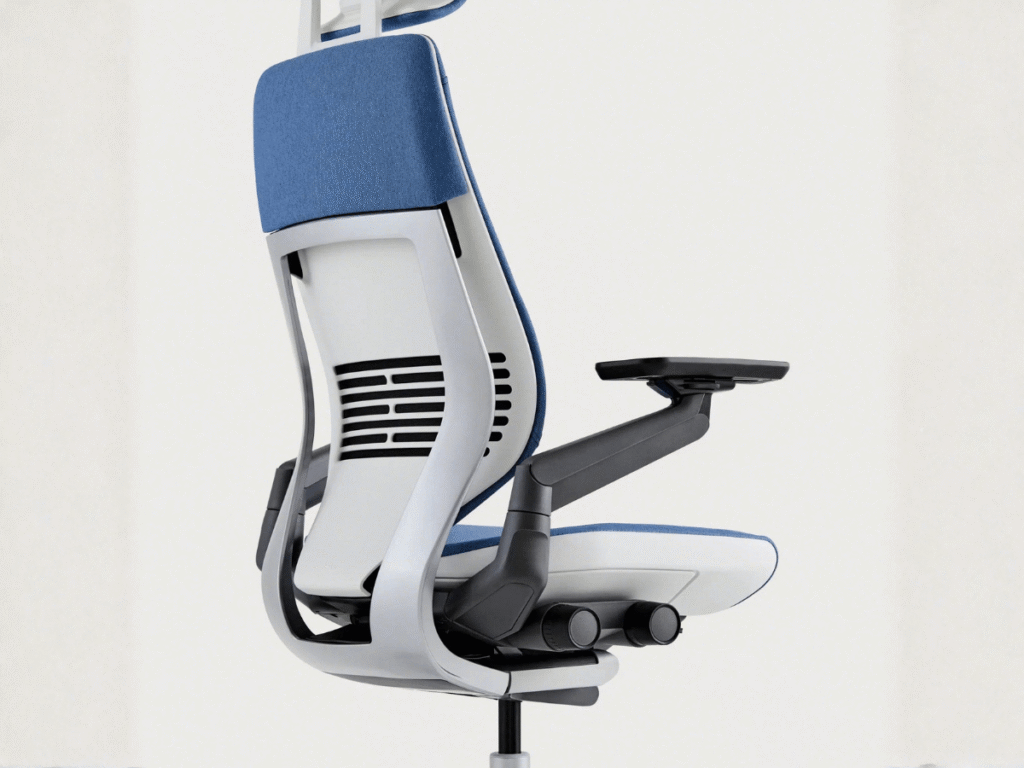 Close-up showing the s curve back support and 360-degree adjustable armrest movement of the Steelcase Gesture chair.