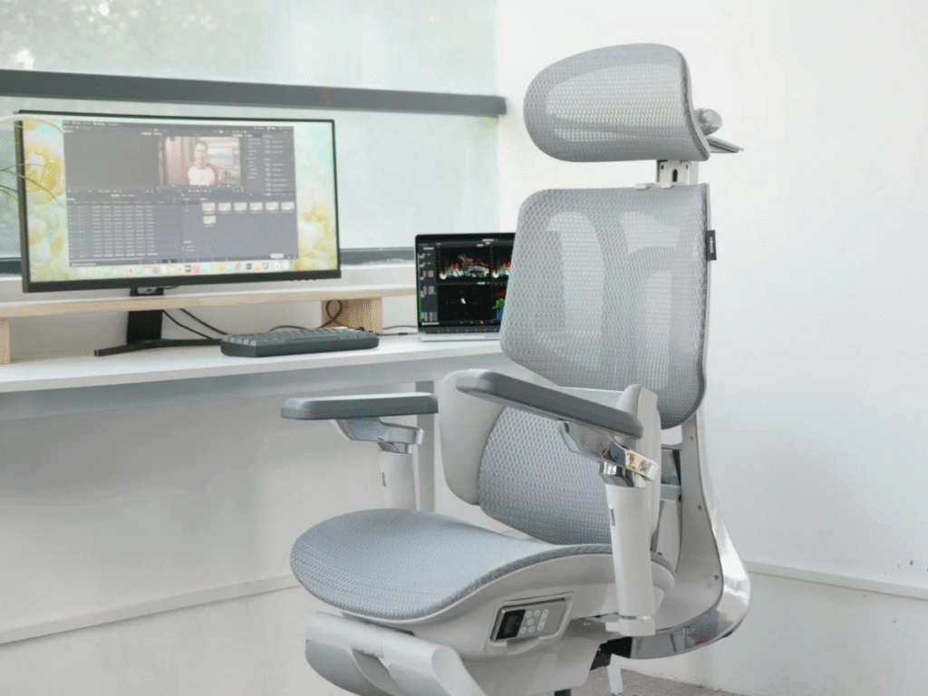 Hbada X7 ergonomic office chair showcasing its headrest, adjustable arms, and mesh back.