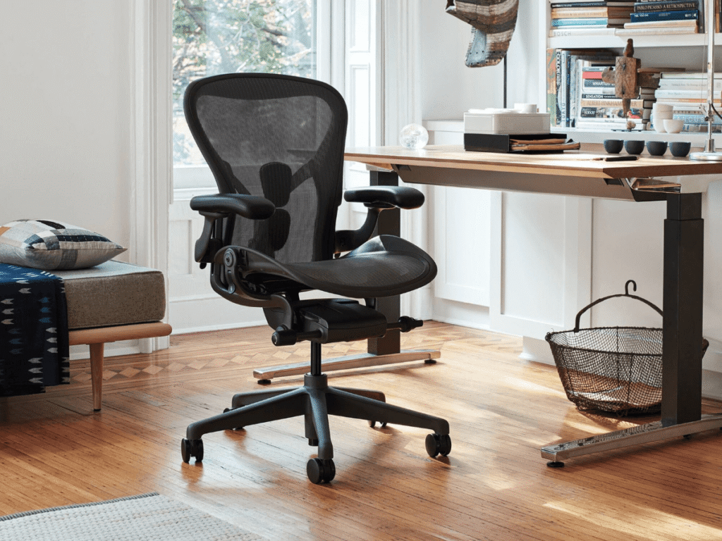 Herman Miller Aeron chair in a modern professional office setting.